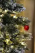 Detail of artificial tree with flocking