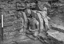 Terracotta Buddha statues, possibly 375 CE.[18]