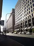 The DuPont Building (center left) and the Nemours Building (right) in 2006.