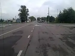 Dytiatky's main road with, the checkpoint in background