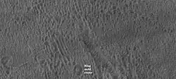 Floor of crater from previous image in Phaethontis quadrangle, as seen by HiRISE under HiWish program Ring mold crater is caused by asteroid reaching an ice layer. Pits on floor may be from ice escaping the ground.