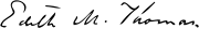 Thomas's signature, slanted leftward, reading "Edith M. Thomas."