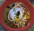The Sonoran style enchilada at El Cholo Spanish Cafe in 2024. This dish was on one of the first dishes offered at the restaurant in 1923.