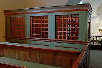 Enclosed pew