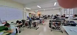 1st grade students of Baccalaureate BIE doing an exam in the Building Vocational Training classroom in 2022