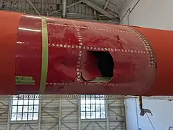 Picture shows a hole in the plane's wing as a result of the collision.
