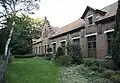 Former factory workers school of the glass factury Glaverbel in Gompel