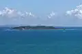 Palominos seen from East, the coast of Fajardo in the background