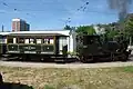 Steam locomotive and four-wheel closed carriage
