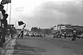 Green flag waves to start the Manila Karting Prix in Luneta.