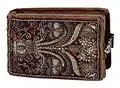 Folger Shakespeare Library's V.a.94. A velvet and embroidered binding by Esther Inglis (?), ca. 1608. Red velvet over pasteboard, decorated with silver thread embroidery and seed pearls. Silver clasp.