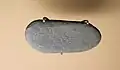 Engraved and painted pebble