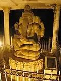 A sculpture of Ganesha protected with a cungkup at the Sultan Mahmud Badaruddin II Museum, Palembang
