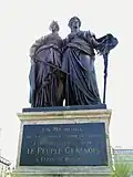 Helvetia (right) with "Geneva" (monument in Geneva)