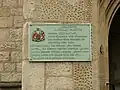 Plaque on a church wall commemorating Catholic martyrs
