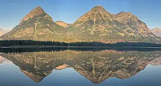 Olson Mountain (left) and Campbell Mountain (right) reflected in Waterton Lake