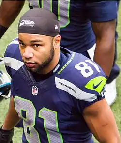 Golden Tate standing in uniform