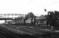 Steam locomotive from the series 4300 of the N.S. with a passenger train in Hilversum. (Between 1945 - 1955)