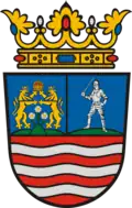 középre