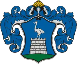 középre