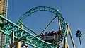 Hangtime's train as it passes over the ride's entrance