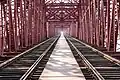 Image 20Hardinge Bridge is a steel railway bridge over the river Padma located at Paksey, Ishwardi, Pabna in western Bangladesh. It is named after Lord Hardinge, who was the Viceroy of India from 1910 to 1916. The bridge is 1.8 kilometres (1.1&nbsp;mi) long. Photo Credit: Azim Khan Ronnie