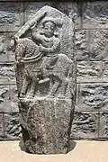 Hero stone with relief sculpture in the Arakeshwara temple at Hole Alur