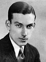 Photographic portrait of Charmichael looking at the camera