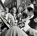 Children meet a liberator, Amsterdam, 1945.