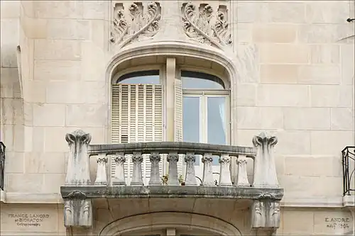 Art Nouveau railing with highly stylized reinterpretations of the Ionic column as balusters, on the France-Lanord Building (Avenue Foch no. 71), Nancy, France, by Émile André, 1904[35]
