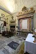 The left wall with monuments to Elizabeth and John.