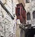 The mashrabiya (a type of oriel window) is a characteristic feature of upper-class homes across the region as in this example from Jerusalem.