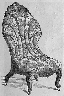Chair carved in black walnut and covered in crimson and gold damask by J. & W. Hilton