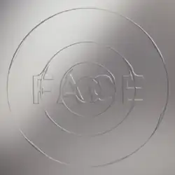 FACE written in uppercase against a square, metallic grey background with ripples