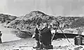 John Raffles Cox taking latitude with sextant at harbour at Cape Barrow