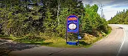 Sign for the Joy Laking Gallery by the road