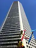 JP Morgan Chase Tower during a summer afternoon