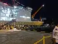 KM Gunung Dempo unloading cargo and passenger at port of Ambon.