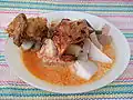 Ketupat sayur, ketupat rice cake in spicy vegetables soup.