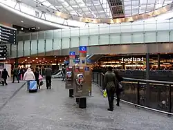 The Airport Centre at-grade level, one level above the station's offices and ticketing machines, and two levels above the tracks