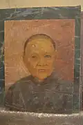 Sena's last college plate. The cigarette burn mark on the forehead was caused by a classmate as it was a tradition to ruin another classmate's last plate.