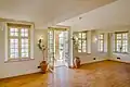 Door to the hall balcony.