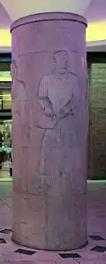 “Mushroom Column” with depictions of working people by Alfred Thiele