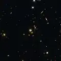 Another lensed quasar, HE0435-1223 in Eridanus, and its surroundings.