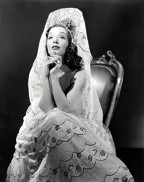 Black and white film still of Lupe Vélez looking serene in Mexican Spitfire (1940)