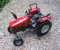 A scale model of a modern Ursus and Fendt tractor in Germany