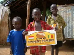 Children welcoming the Budapest-Bamako in Mahina, Mali