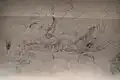 Drawings of a reclining woman and a flying man/angel on the south wall