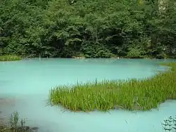 Mineral lake in the gorge of the river Ardon River