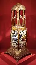 Chinese porcelain stool (1575-1600) with Ottoman metallic mounting and modifications (1618) for use as an incense burner Turkish and Islamic Arts Museum.